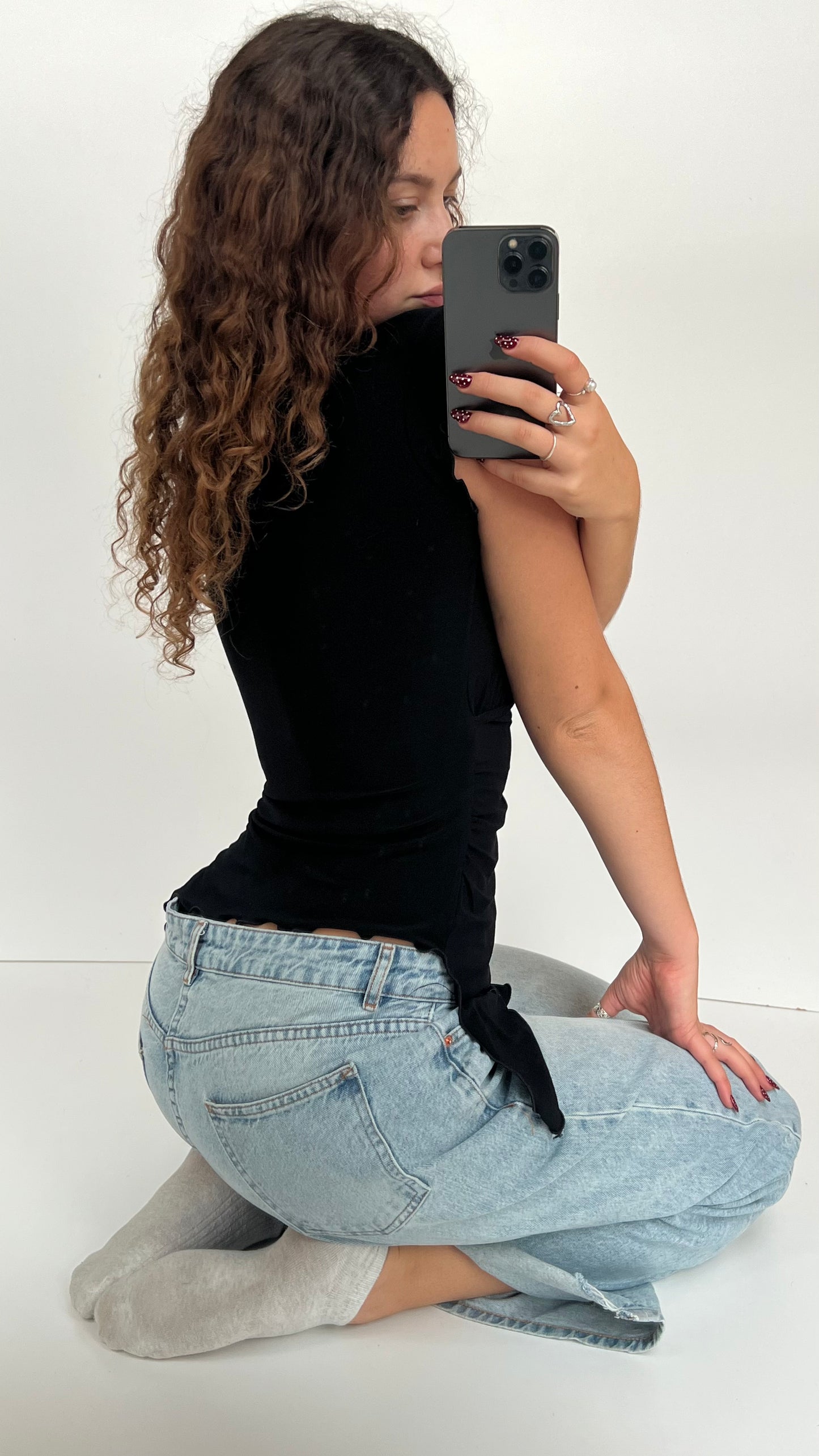 00s black asymmetrical top- size M