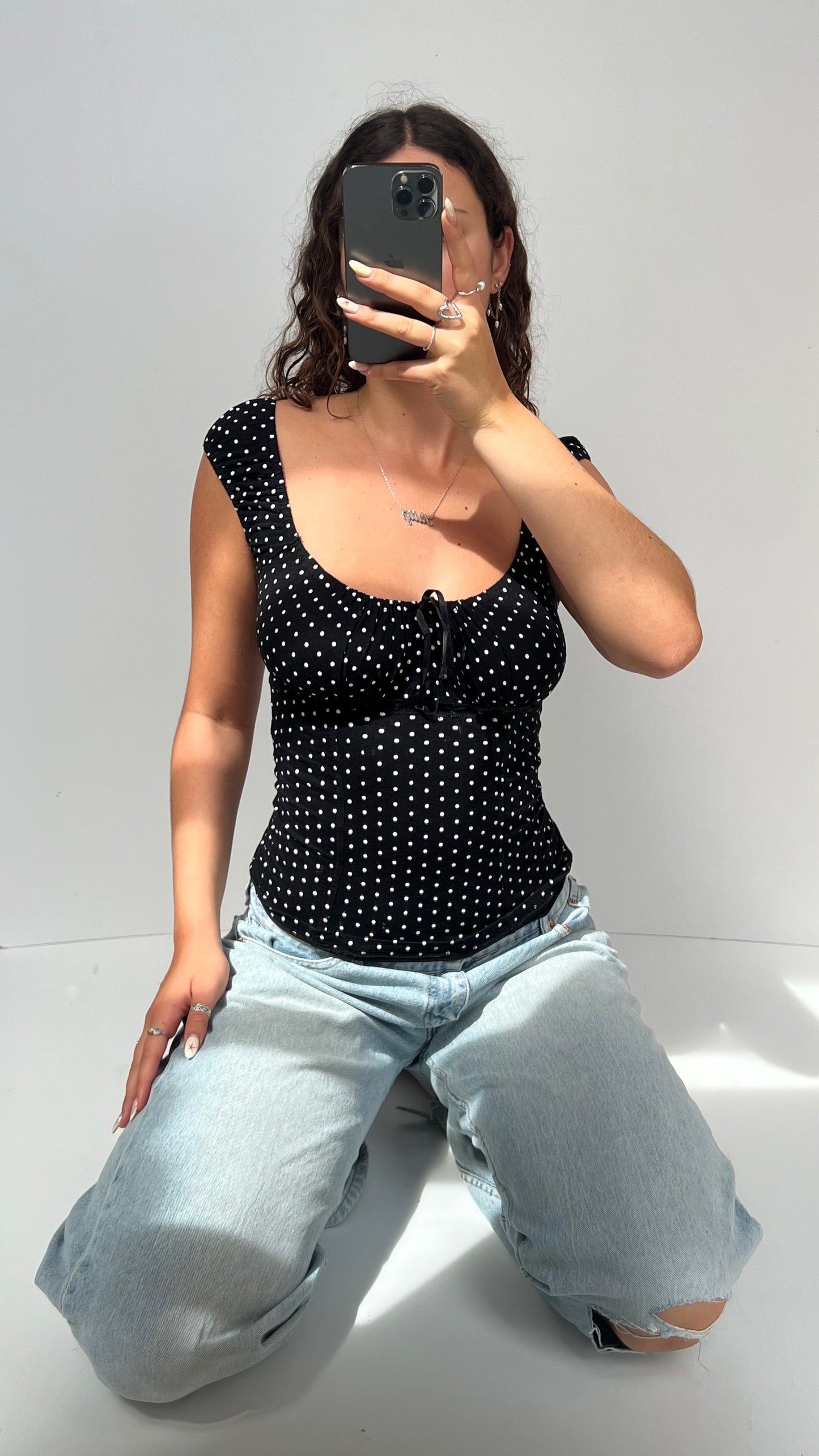00s black polka dot top- size M