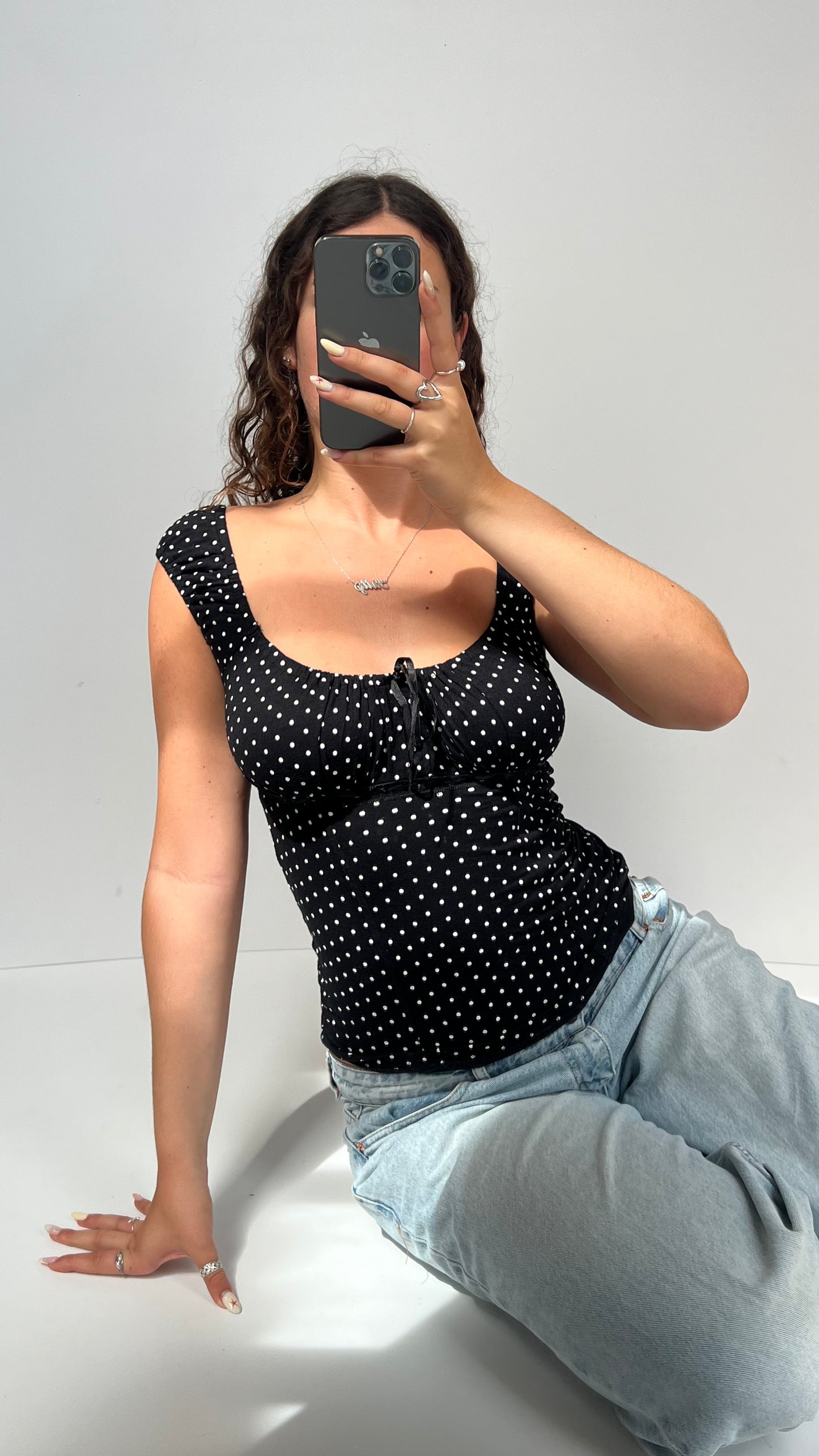 00s black polka dot top- size M