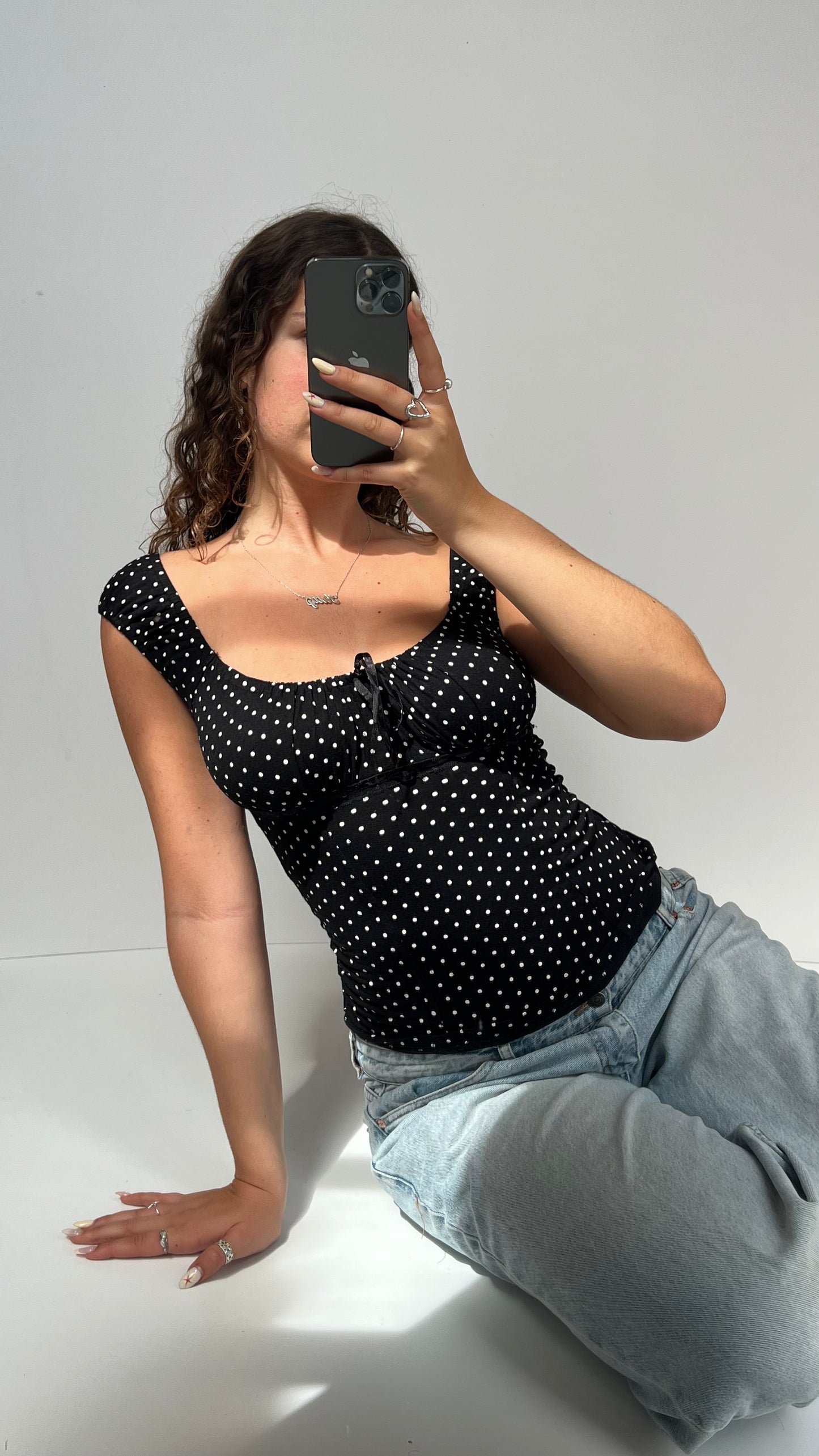 00s black polka dot top- size M