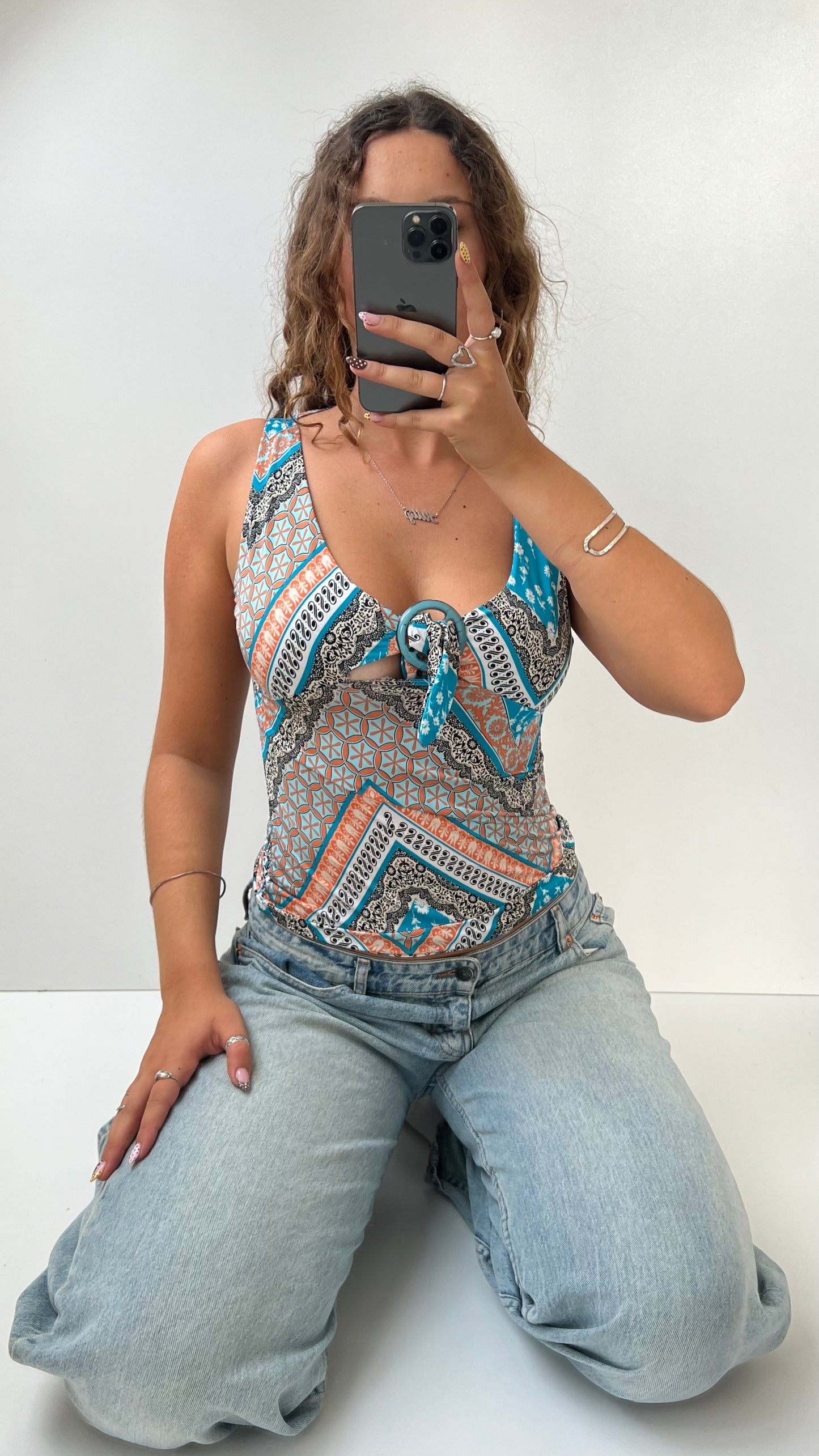 00s blue orange slinky patterned top- size S