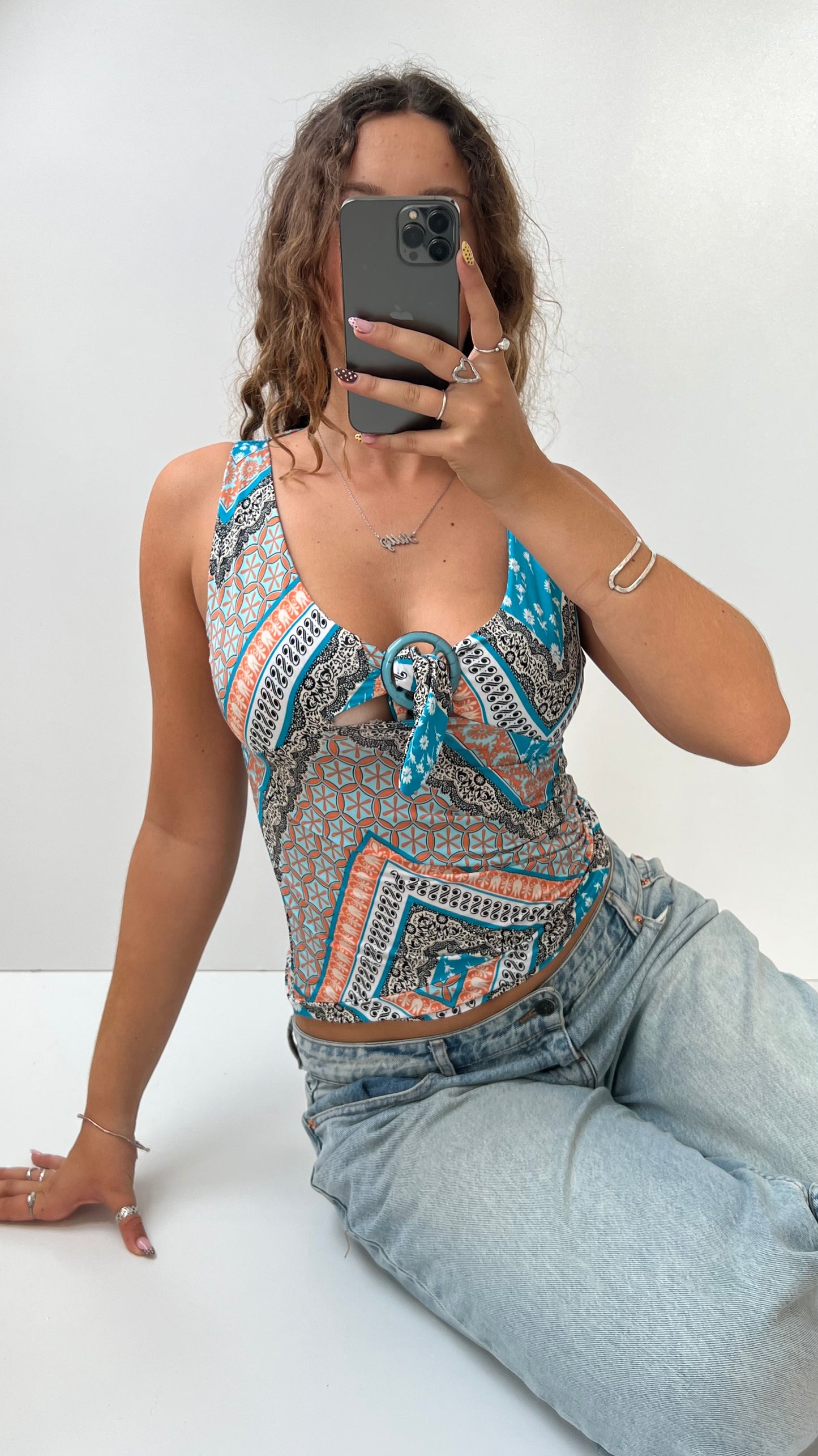 00s blue orange slinky patterned top- size S