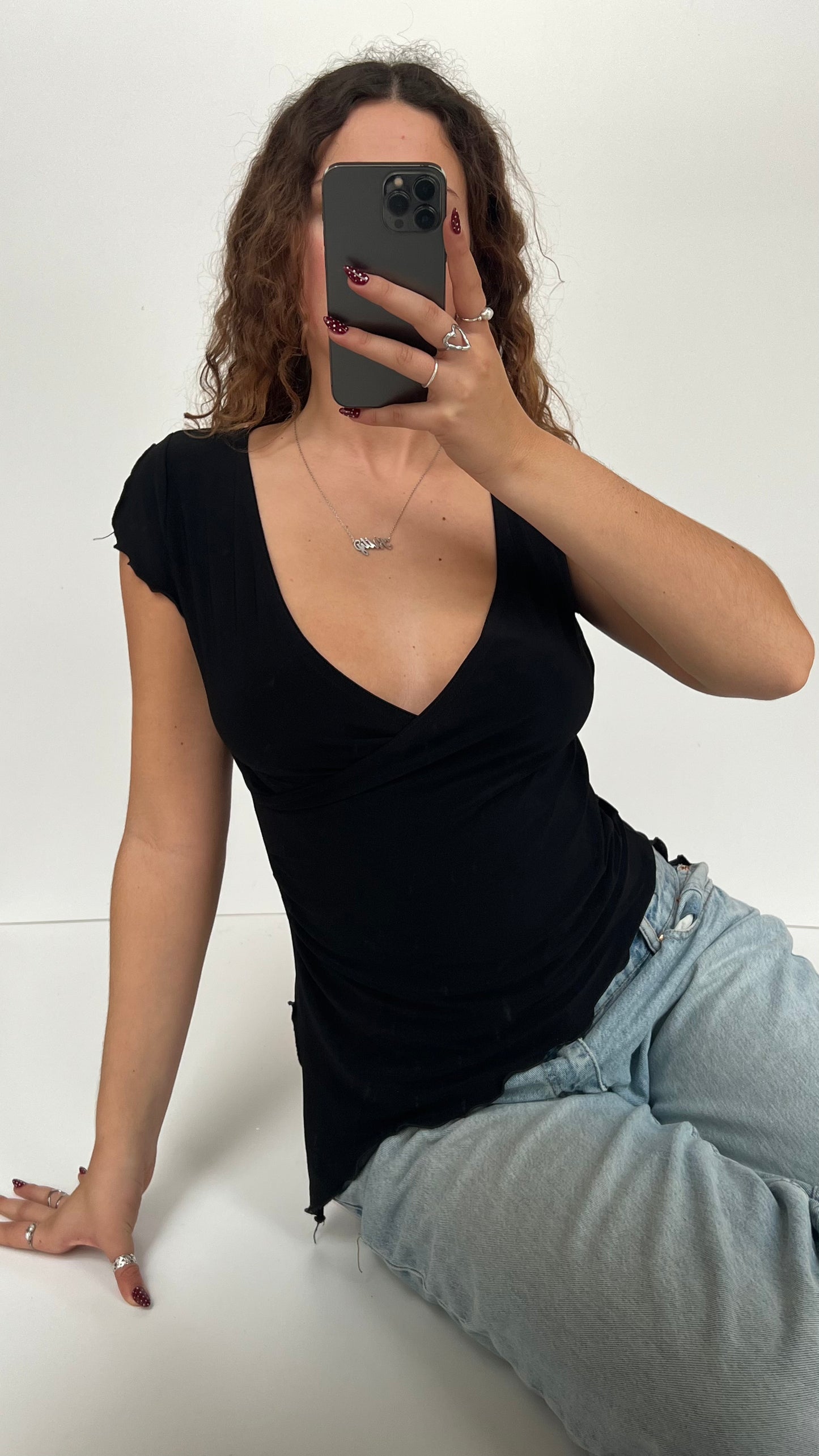 00s black asymmetrical top- size M