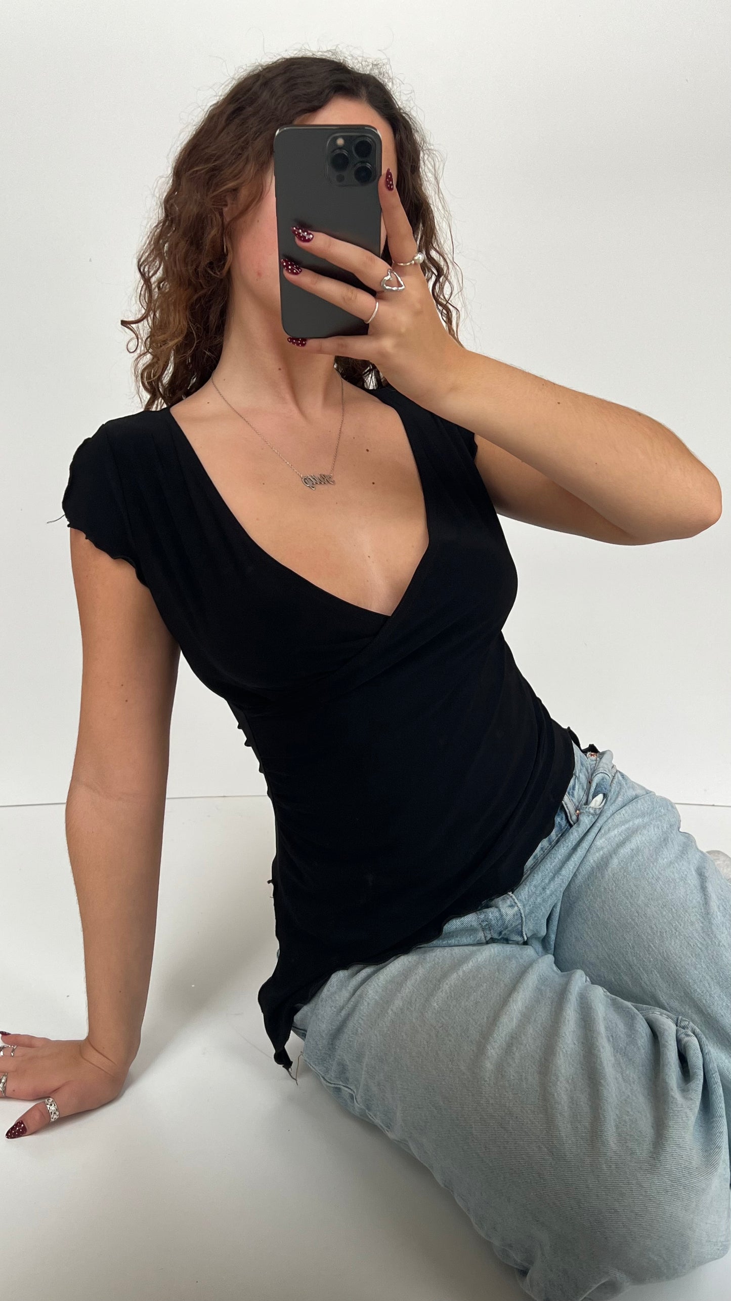 00s black asymmetrical top- size M